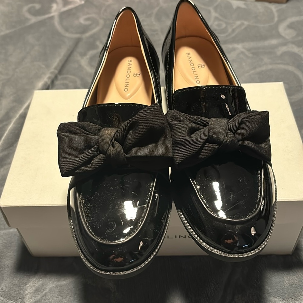 Very gently worn black loafers with ribbon bow